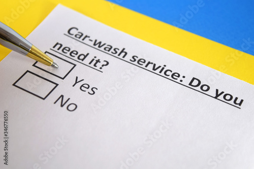 One person is answering question about car wash service.