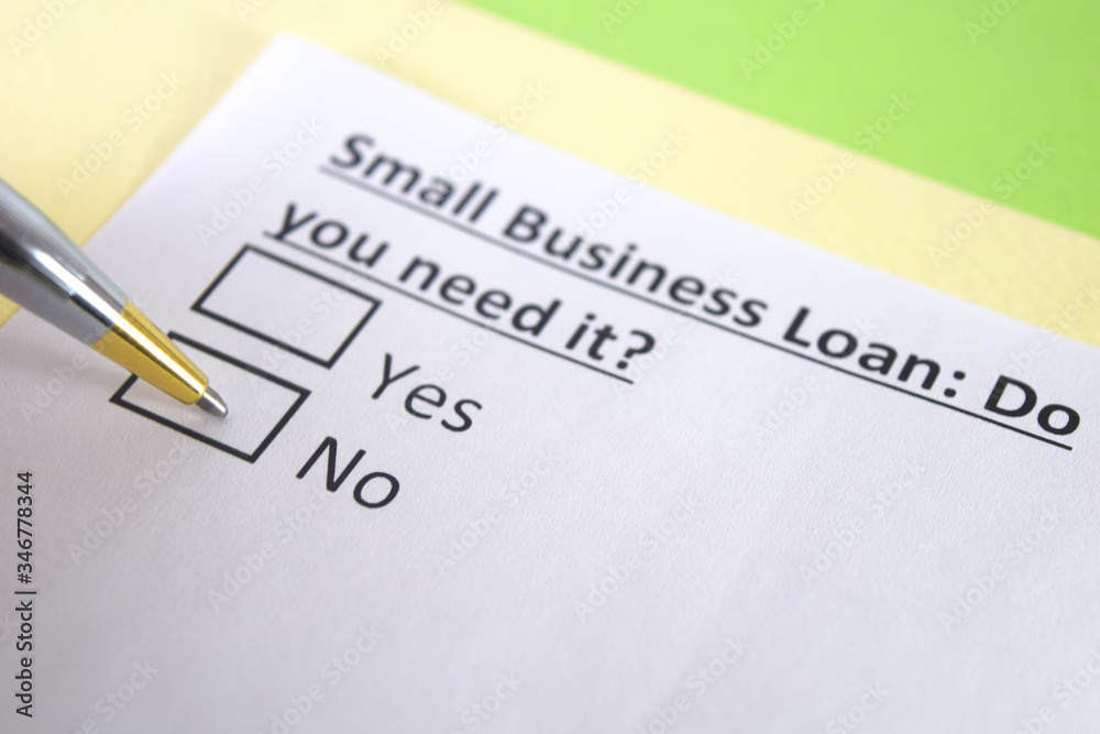 One person is answering question about small business loan. One person is answering question about small business loan.