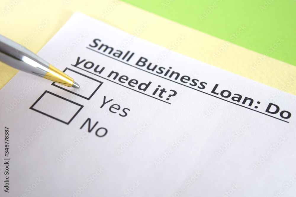 One person is answering question about small business loan. One person is answering question about small business loan.