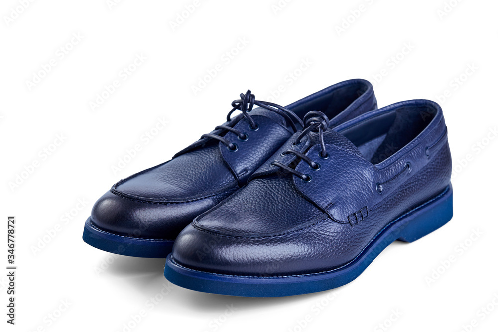Men's classic blue leather shoes with laces and blue rubber outsole. Deck collection. Top view at an angle.