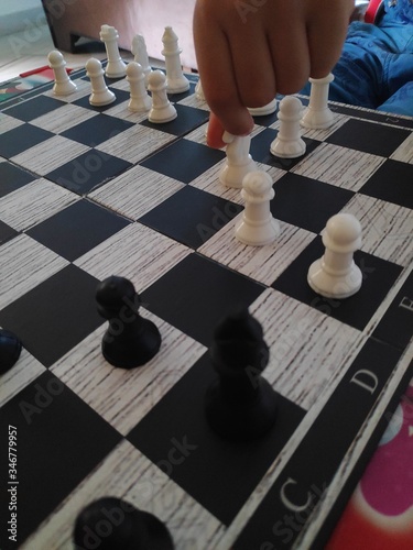 Concept of Board games  entertainment  games at home. Stay home  safe yourself. Game of chess at home.