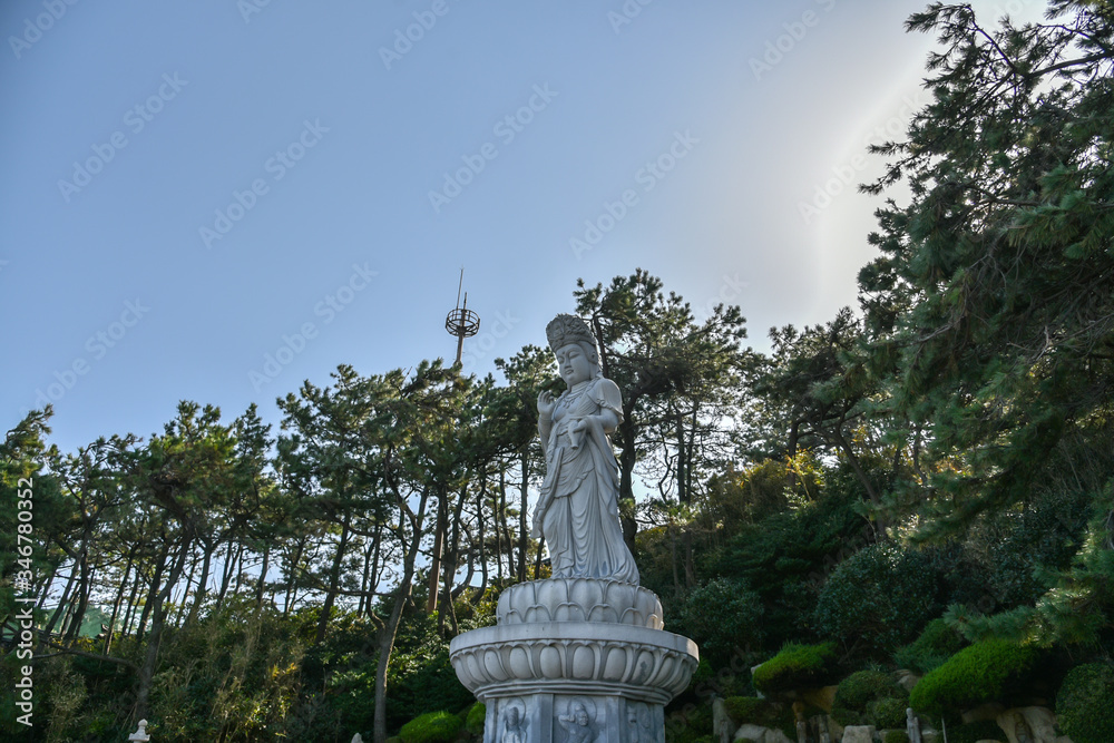 Carved stone statues in Guanyin figures at Haedong Yonggung Temple in Busan , South Korea