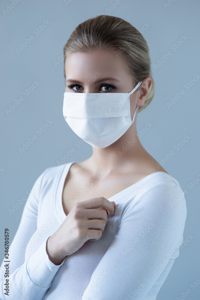 Portrait of young and natural woman in medcial mask. Pandemic, coronavirus, covid-19 and protection concept.