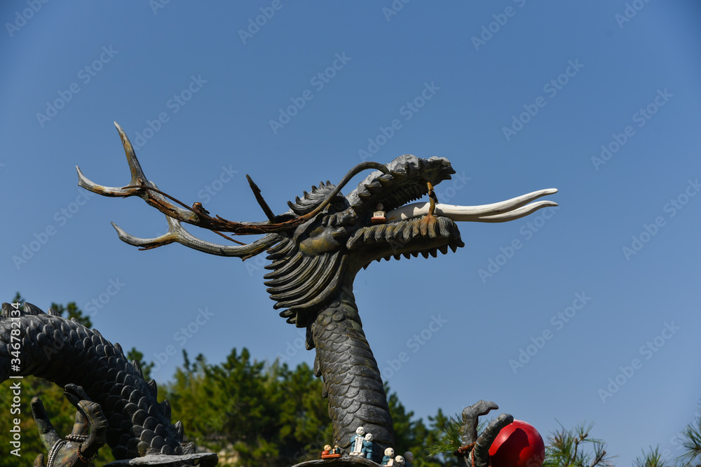 Carved stone statues in Dragon figures at Haedong Yonggung Temple in Busan , South Korea