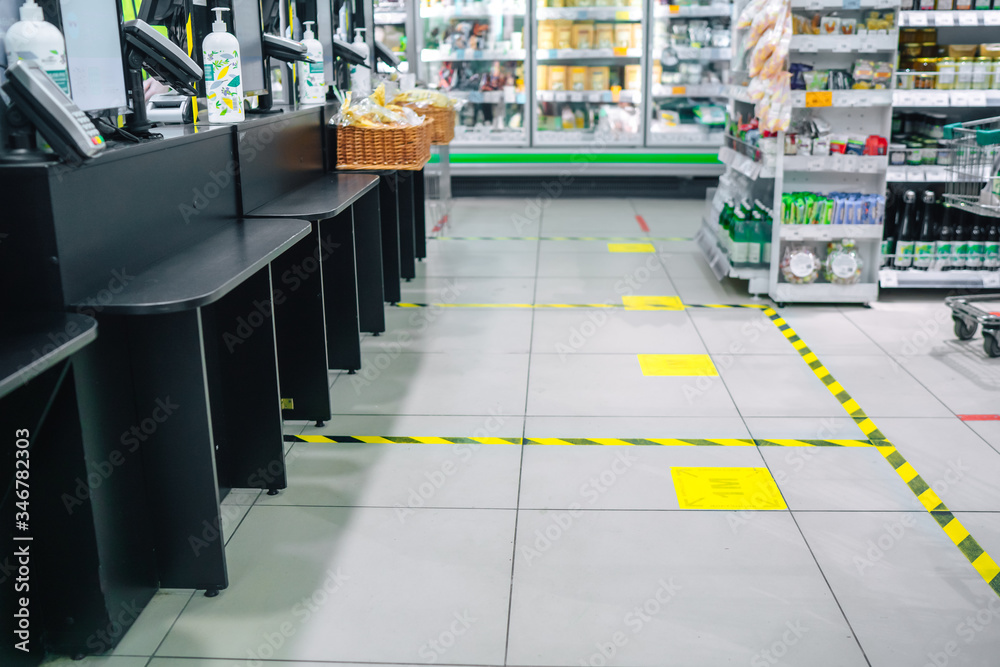 Obraz premium epidemic protection measures, Social Distance Shopping Line Up, keeping the distance in the supermarket, COVID 19