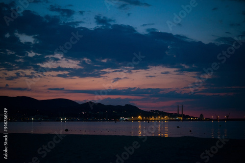Evening beach in the Mediterranean sea, Palma de Mallorca, Puerta de Alcudia © Evgenija