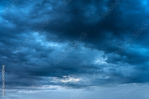 Storm evening dark blue clouds. Sunset