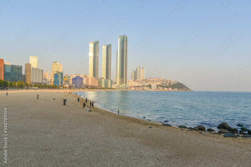 Busan city, South Korea - NOV 02, 2019: People relaxing and having fun on Haeundae Beach.One of the famous beautiful attractions in Busan.