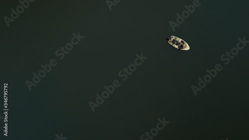 aerial view of a boat in a lake