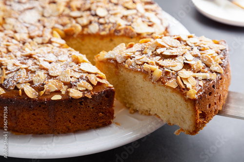 Cuadro en lienzo Sponge almond and lemon cake close up