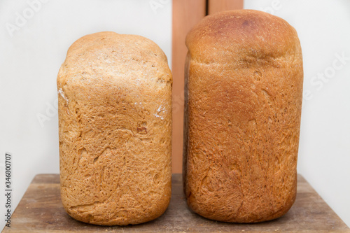 Freshly baked bread was baked at home in a bread maker