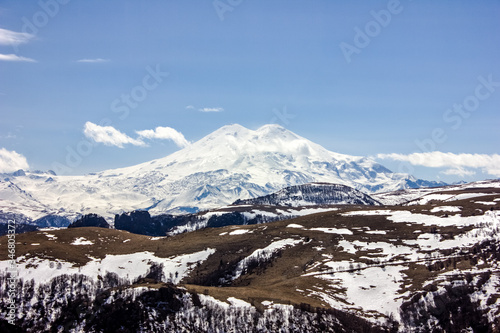 Russia Caucasus  Kabardino-Balkarian Republic. View of snowy Elbrus in spring in clear weather ..