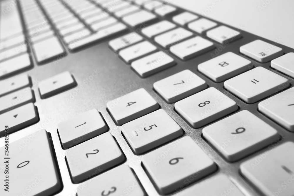 Fragment of metal computer keyboard. Smal depth of focus Fragment of metal computer keyboard. Smal depth of focus