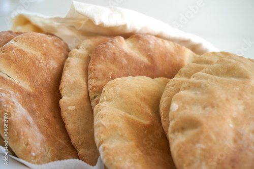 Pita bread on a white background - fresh baked gluten-free pita bread