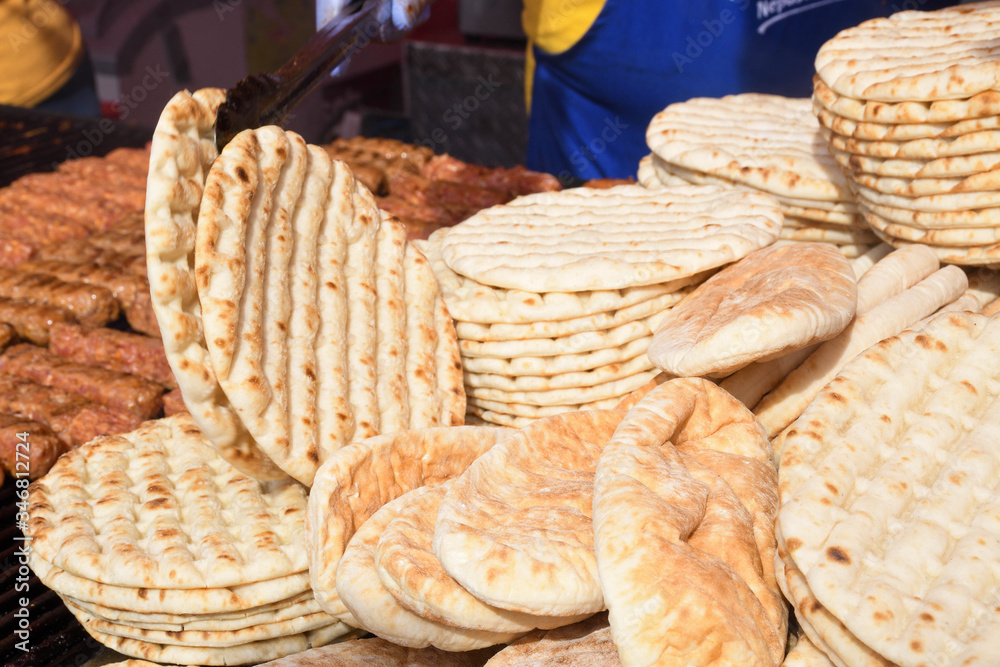 Pile of fresh pita flat bread. Gluten free lebanese or greek specialty.