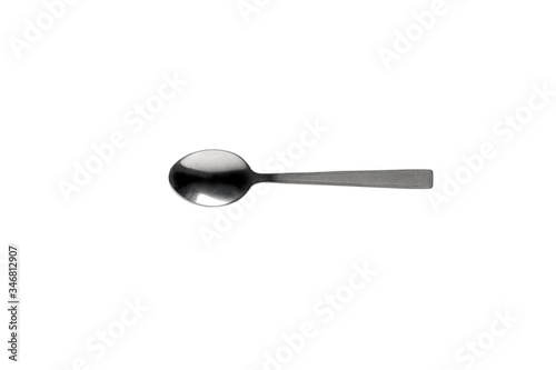 cucchiaino per caffe ripreso dall'alto, isolato su sfondo bianco photo