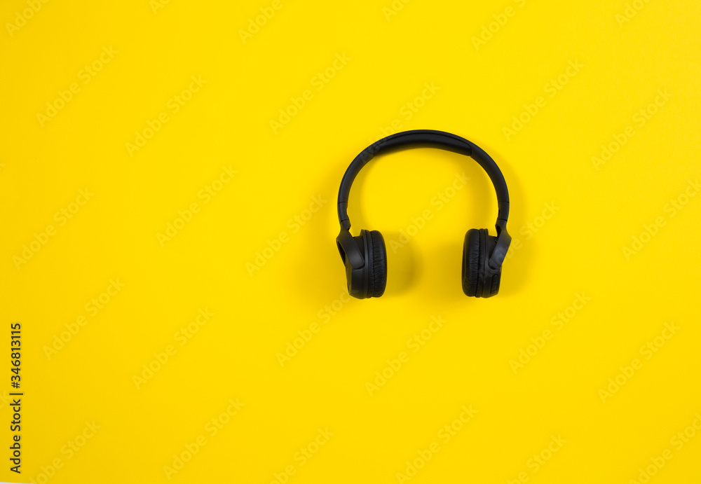 Headphones isolated on yellow background Headphones isolated on yellow background