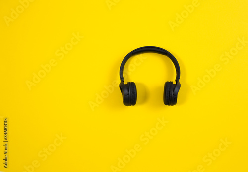 Headphones isolated on yellow background