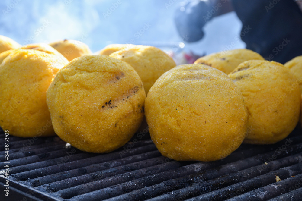 Balls of polenta and cheese in the middle of it, named bulz, a traditional romanian dish. Balls of polenta and cheese in the middle of it, named bulz, a traditional romanian dish.