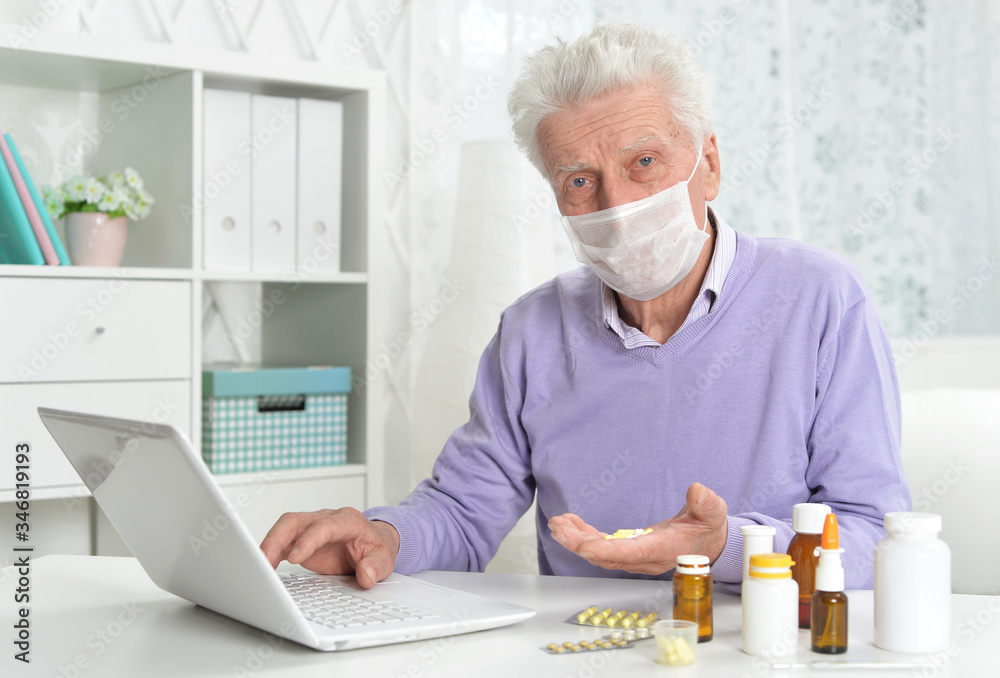 Portrait of sad sick senior man with facial mask Portrait of sad sick senior man with facial mask