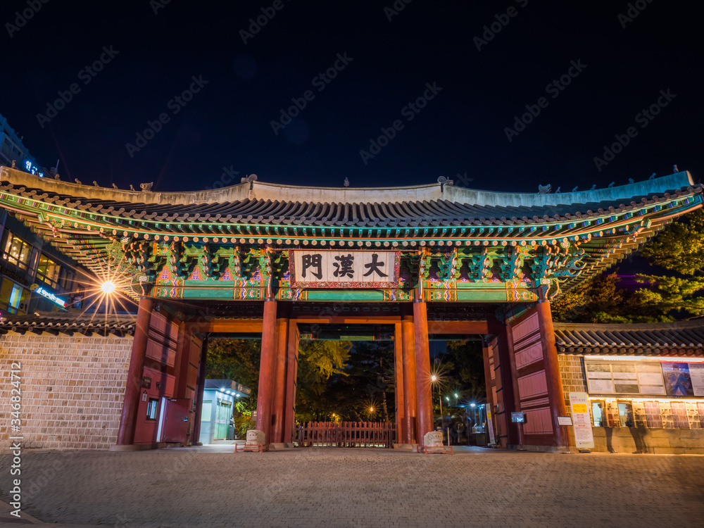 Night Royal palace in Seoul. National Korean buildings on sunset