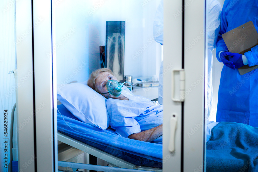 The patients were quarantined in the quarantine room looking out. To prevent the infection from coronavirus COVID19 spreading.