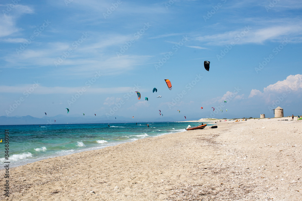 Windy day on sea beach, kite surf, Ionian sea, Lefkada island, Greece
