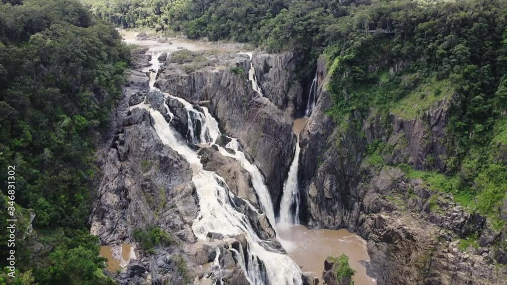 A large and beautiful Waterfall is flowing in Australian Rainforest A large and beautiful Waterfall is flowing in Australian Rainforest