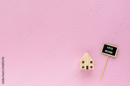 Wooden house model with sta...
