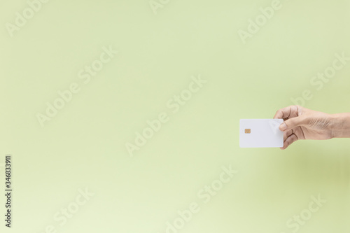 Hand holding blank credit c...