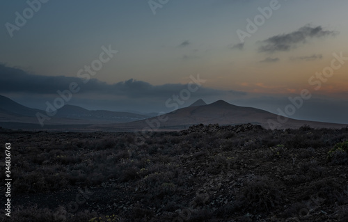 Landscape mountain fantasy at sunset in Calle Montana de la Arena, Fuerteventura, Canary islands, Spain. October 2019