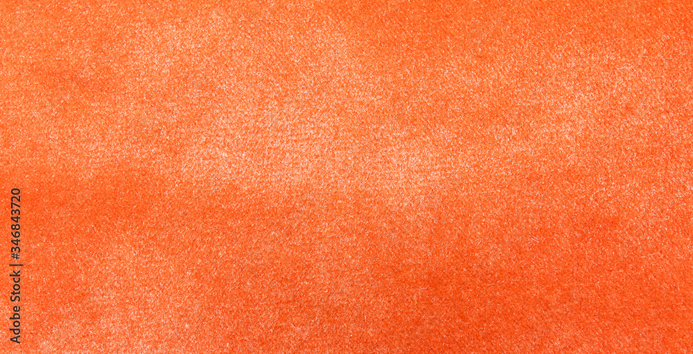 Fototapeta premium Orange smooth fabric background texture