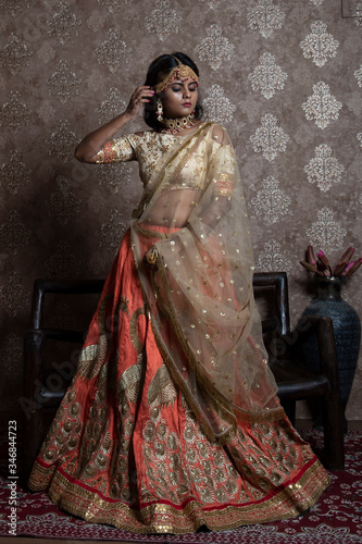 beautiful indian bride wearing traditional indian bridal dress