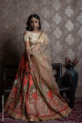 beautiful indian bride wearing traditional indian bridal dress