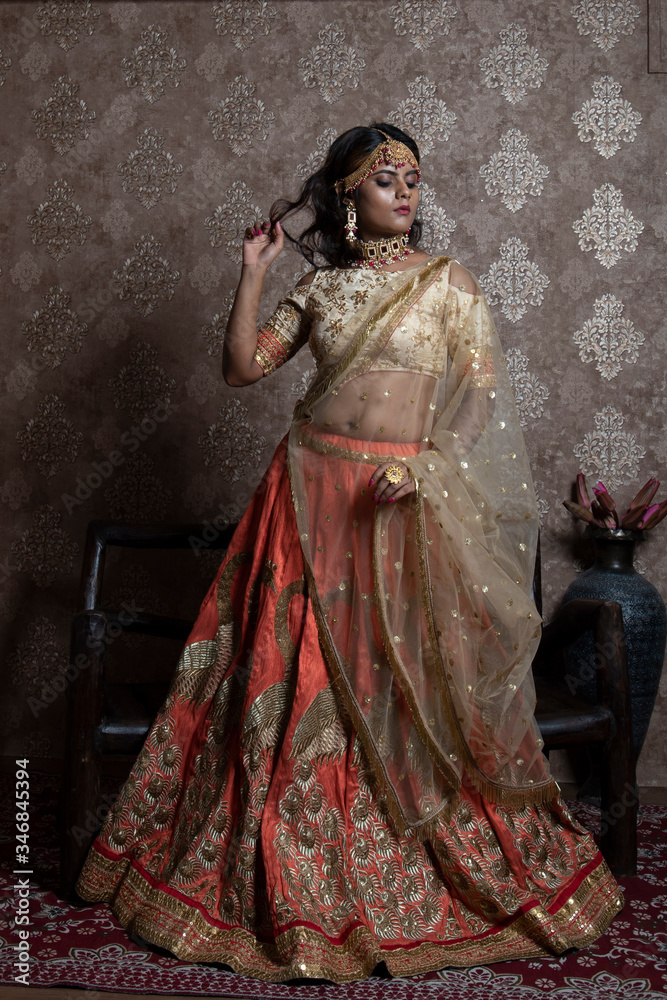 beautiful indian bride wearing traditional indian bridal dress