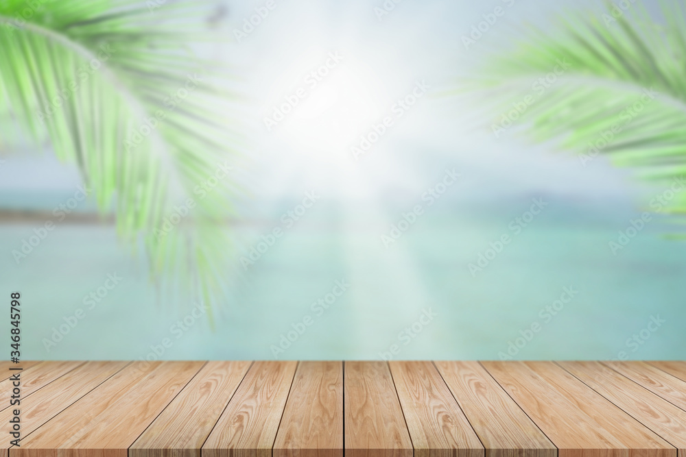 Perspective empty wood table on top over blur summer background. For montage products display or design layout. Perspective empty wood table on top over blur summer background. For montage products display or design layout.