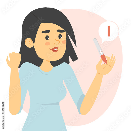Happy woman holding a negative pregnancy test