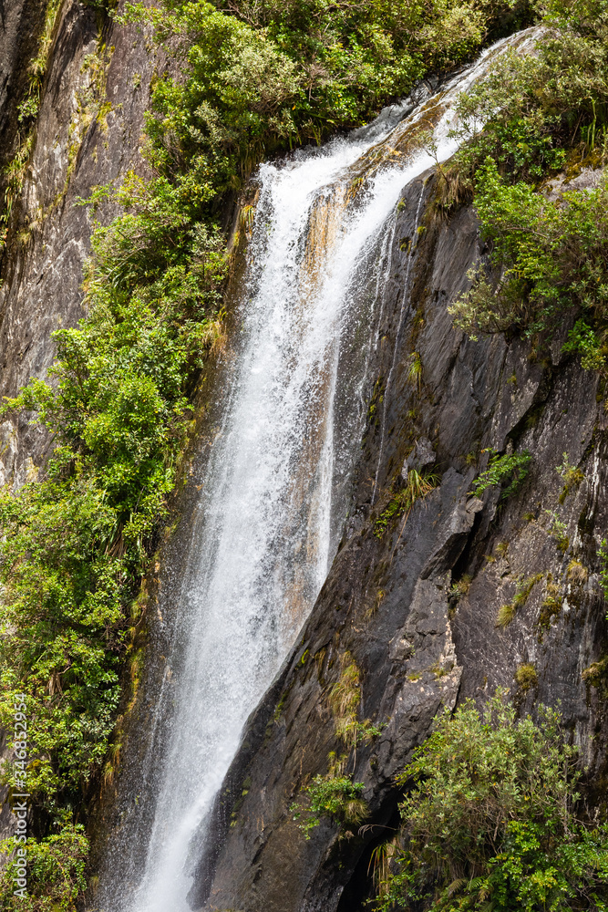 A high waterfall on the way to Franz Josef Glacier. South Island, New Zealand