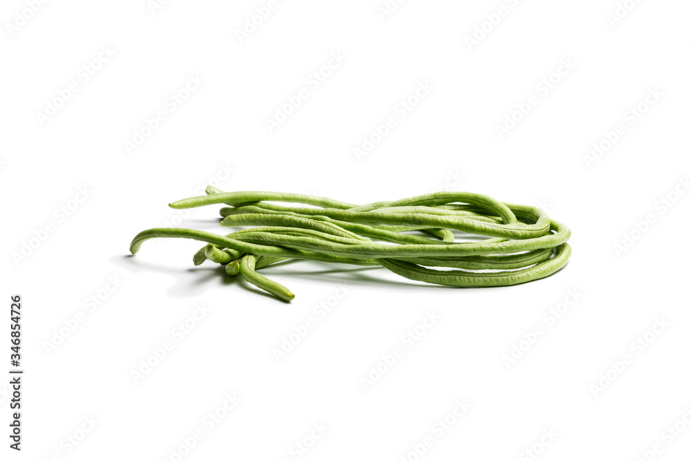 A bunch of fresh green long beans or cowpeas isolated on white background. Healthy food. Macro & close-up.