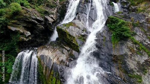 Wallpaper Mural Video of slow motion and tilt down camera movement at Krung Ching Waterfall in rainning season. There is placed in Abundant forest at Nakhon Si Thammarat province. Torontodigital.ca