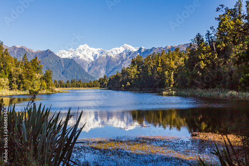 Fototapeta Naklejka Na Ścianę i Meble -  Landscapes of New Zealand. Matheson lake - Mirror Lake. Southern Alps. South Island