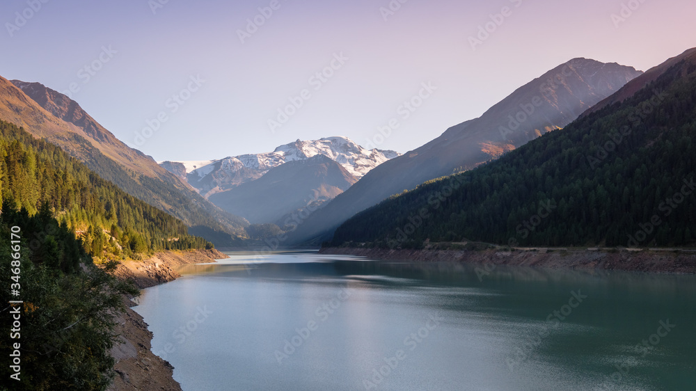 Evening at the gorgeous Gepatsch Reservoir in the Kauner Valley (Tyrol, Austria). This valley features one of the most beautiful mountain roads, the Kauner Valley Glacier Road.
