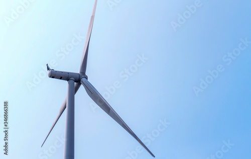 Wind turbines power generator over blue sky © NtDanai
