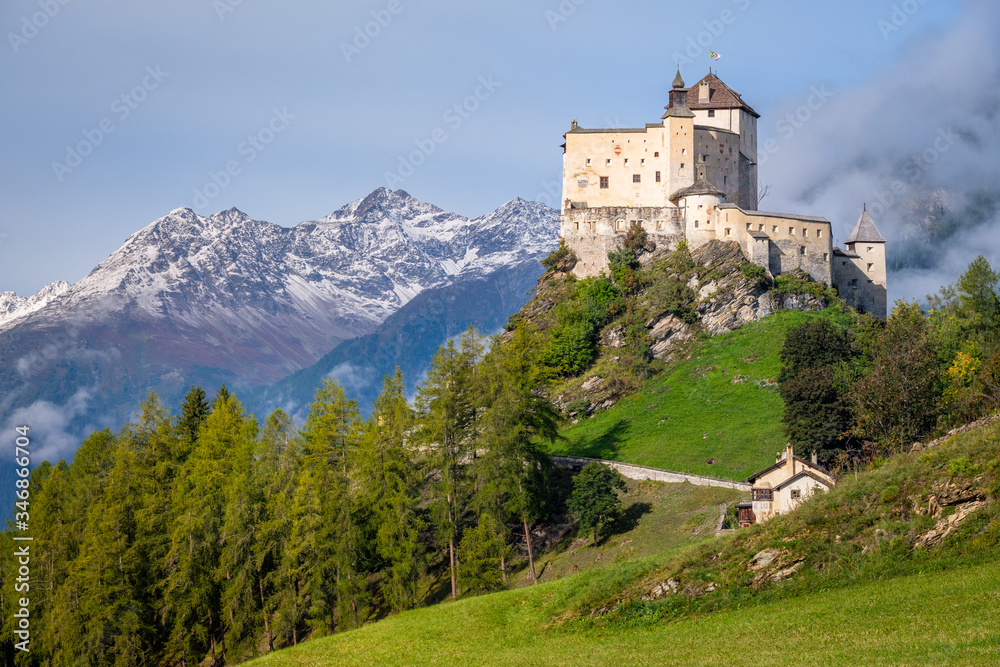Mountains surrounding Tarasp castle, in the canton of Graubünden (Engadin) Switzerland. Tarasp is a village in Graubünden, Switzerland.  The castle is a Swiss heritage site of national significance