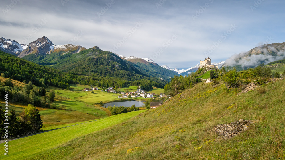 Mountains surrounding Tarasp castle, in the canton of Graubünden (Engadin) Switzerland. Tarasp is a village in Graubünden, Switzerland.  The castle is a Swiss heritage site of national significance