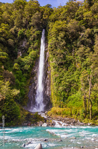 Landscapes of South Island. Small waterfall among the greenery. New Zealand