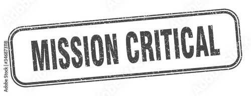 mission critical stamp. mission critical square grunge sign. label