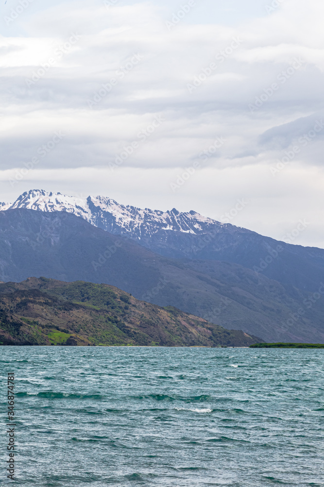 Landscapes of  Wanaka lake. Snow, stones and water. South Island, New Zealand
