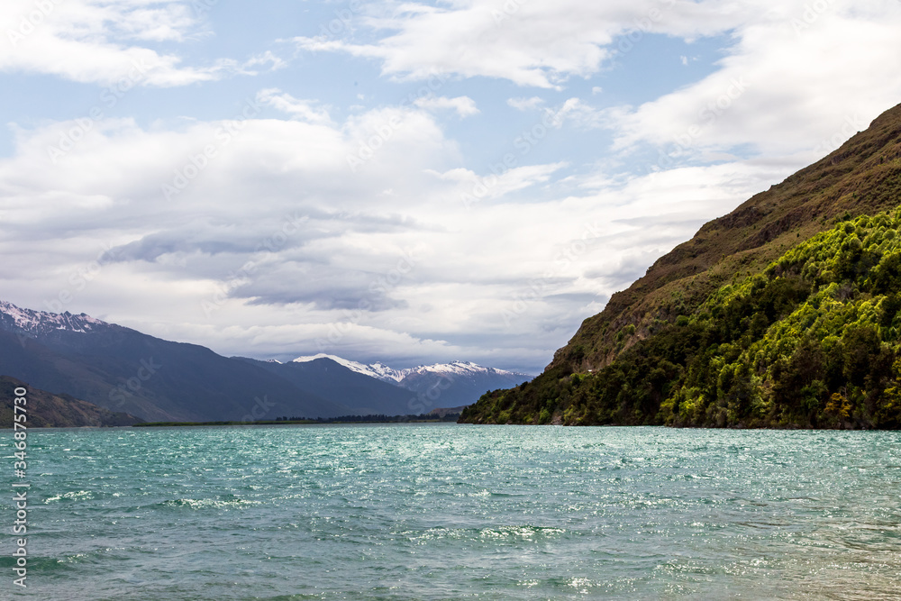Panorama of lake. Wanaka lake. Snow and cliffs. South Island, New Zealand Panorama of lake. Wanaka lake. Snow and cliffs. South Island, New Zealand