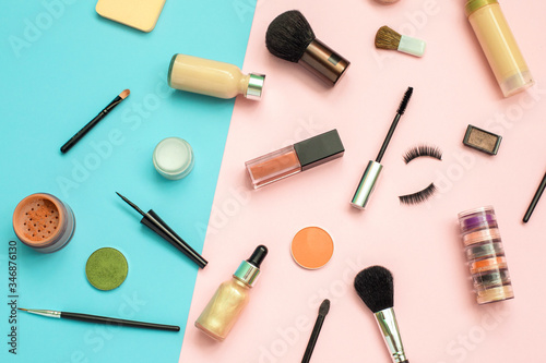 Set of decorative cosmetics on color background. Makeup cosmetics tools background